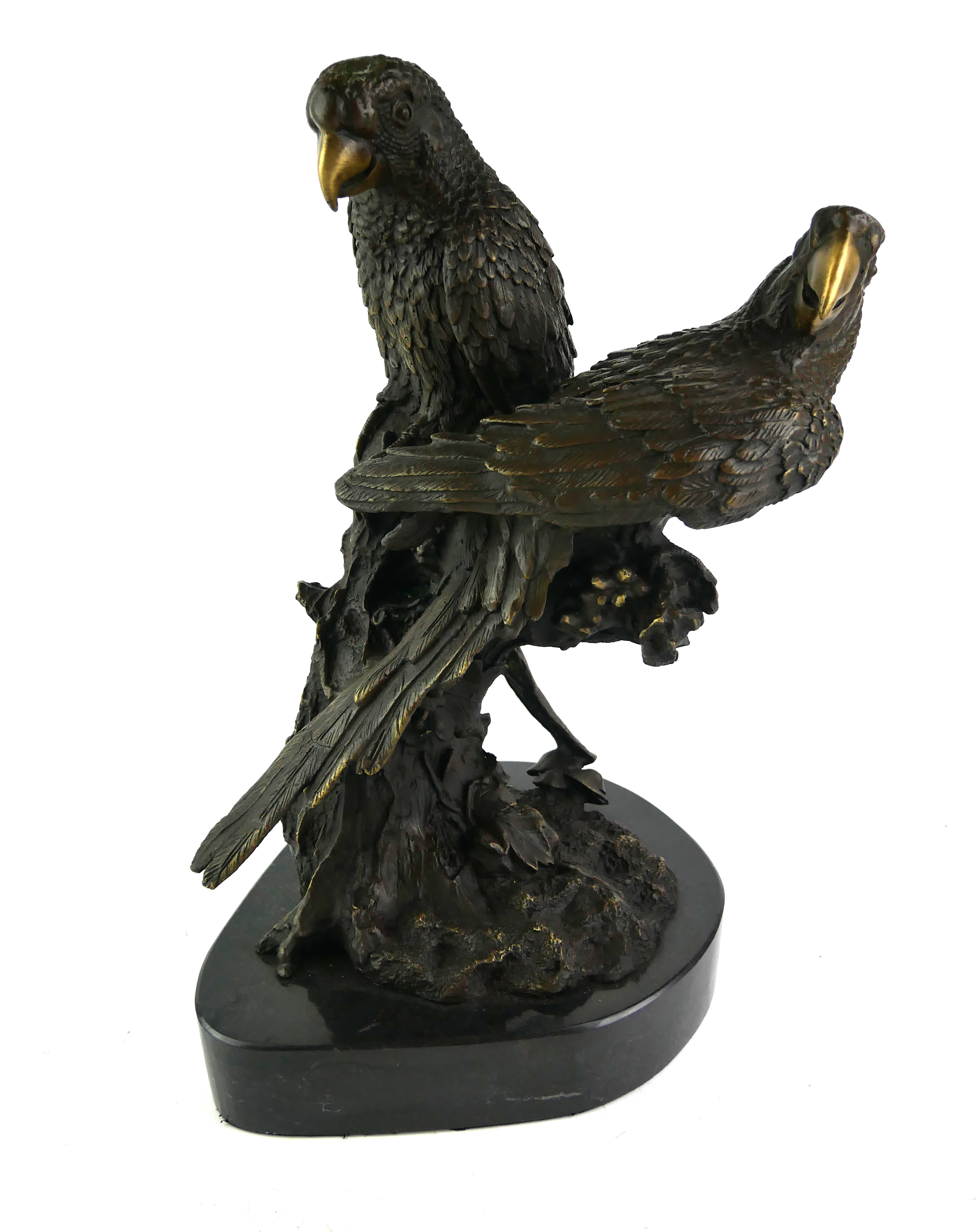 AFTER MIGUEL FERNANDO LOPEZ (MILO), A BRONZE PARROT GROUP Two parrots in opposing pose bearing