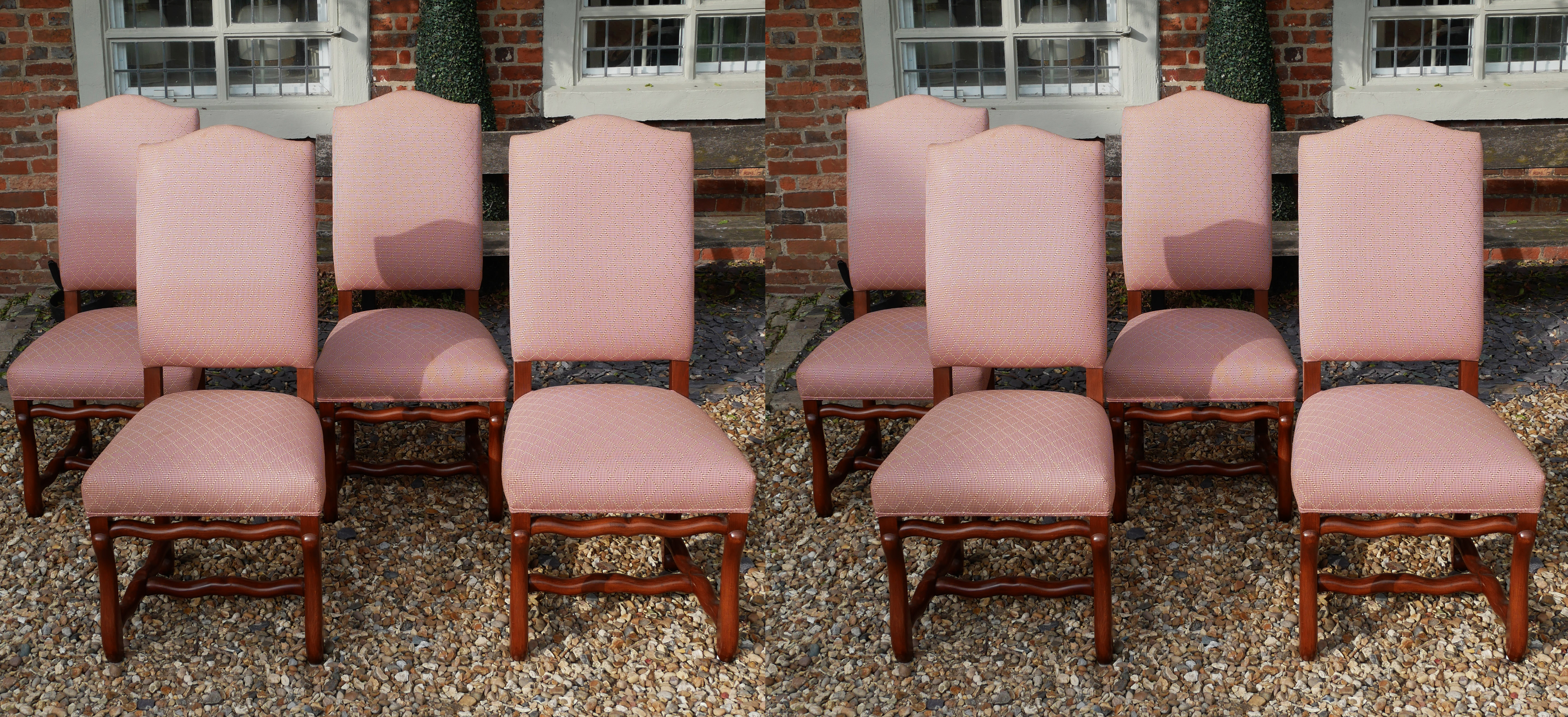 A SET OF EIGHT QUEEN ANNE STYLE DINING CHAIRS Pale salmon pink fabric upholstery, on mahogany legs