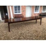 AN 18TH/19TH CENTURY FRENCH FRUITWOOD REFECTORY TABLE The four plank top above four drawers,