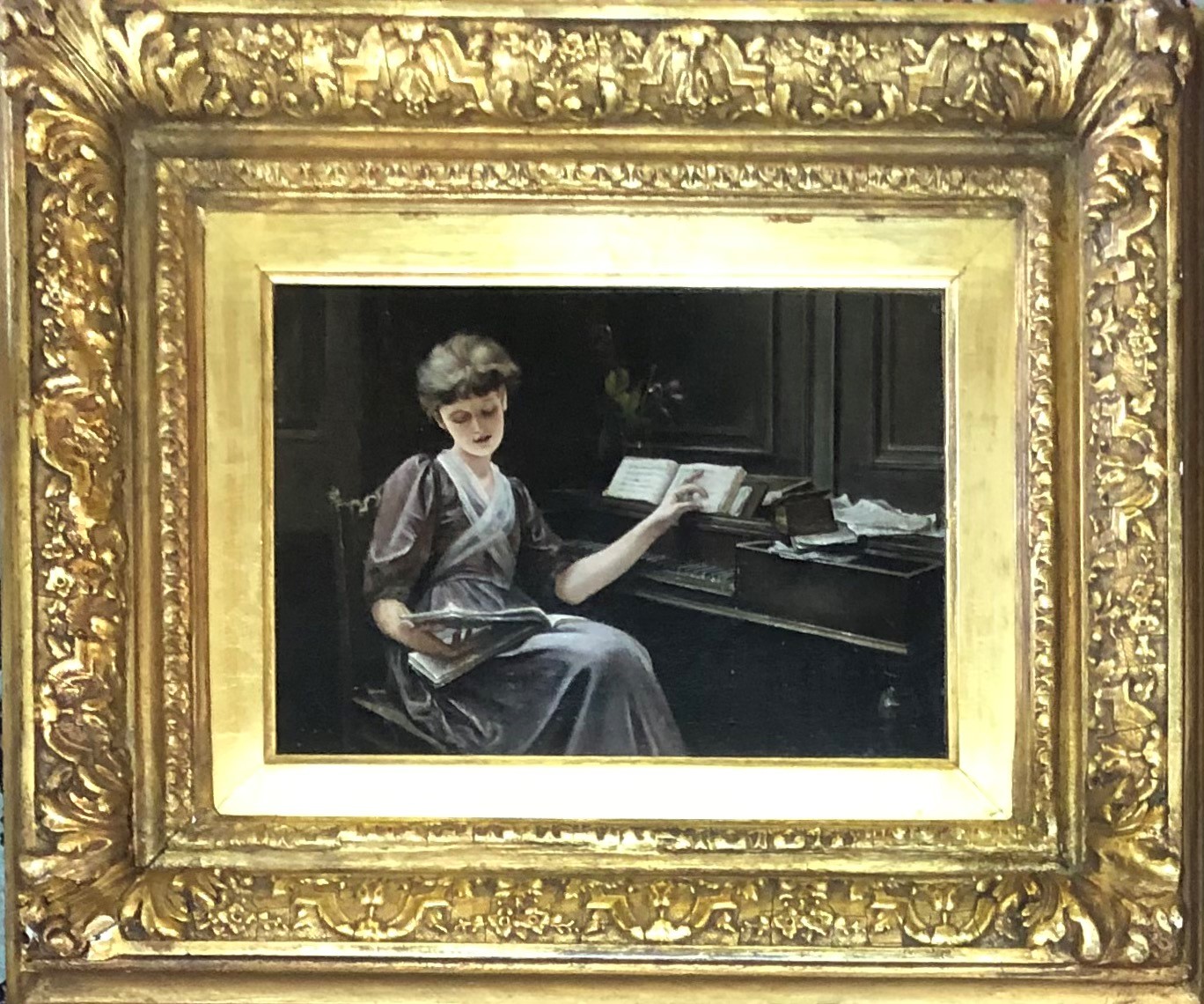 A FINE 19TH CENTURY OIL ON CANVAS, LADY SEATED BY A PIANO In a heavy decorative gilt frame. (45cm - Image 2 of 3