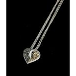 AN 18CT WHITE GOLD BLACK AND COGNAC DIAMOND PENDANT NECKLACE A heart form pendant set with round cut