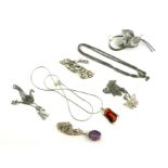 A COLLECTION OF VINTAGE SILVER JEWELLERY Comprising four pendant necklaces including amber, a figaro