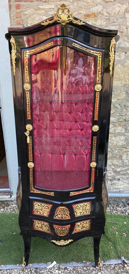 A CONTINENTAL BOULLE AND EBONISED DISPLAY CABINET Applied with gilt metal mounts, the single