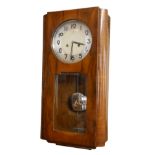 AN EARLY 20TH CENTURY WALNUT AND CHROME WALL CLOCK Having a silver tone dial marked Junghans and