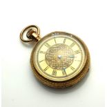 AN EARLY 20TH CENTURY 10CT GOLD LADIES' POCKET WATCH Open face with gold tone dial and screw