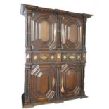 AN IMPRESSIVE 17TH CENTURY DUTCH OAK CABINET With dentil cornice above four ribbed panelled doors