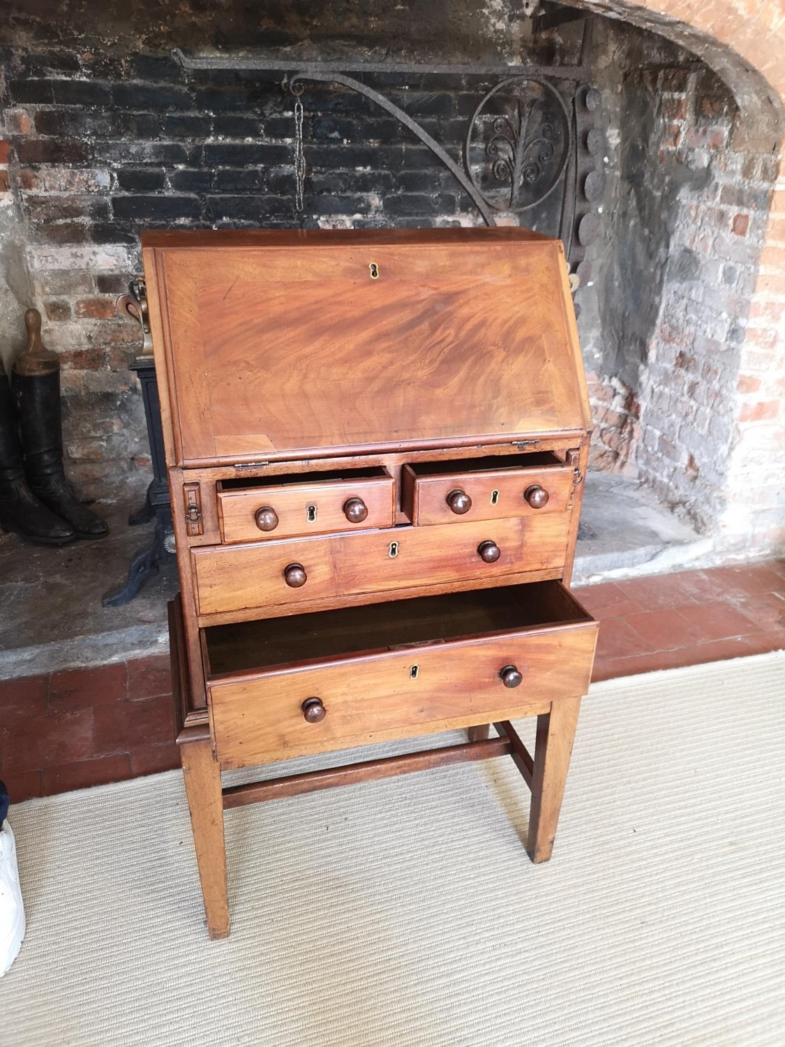 A GEORGIAN AND LATER CHILDS MAHOGANY WRITING BUREAU The fall front enclosing a fitted interior above - Image 2 of 4