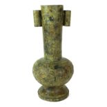 AN ORIENTAL ARCHAIC SHAPED BRONZE ARROW VASE Decorated with script and foliage. (h 28cm)