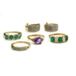 A COLLECTION OF 9CT GOLD AND GEM SET JEWELLERY To include a three stone emerald ring interspersed