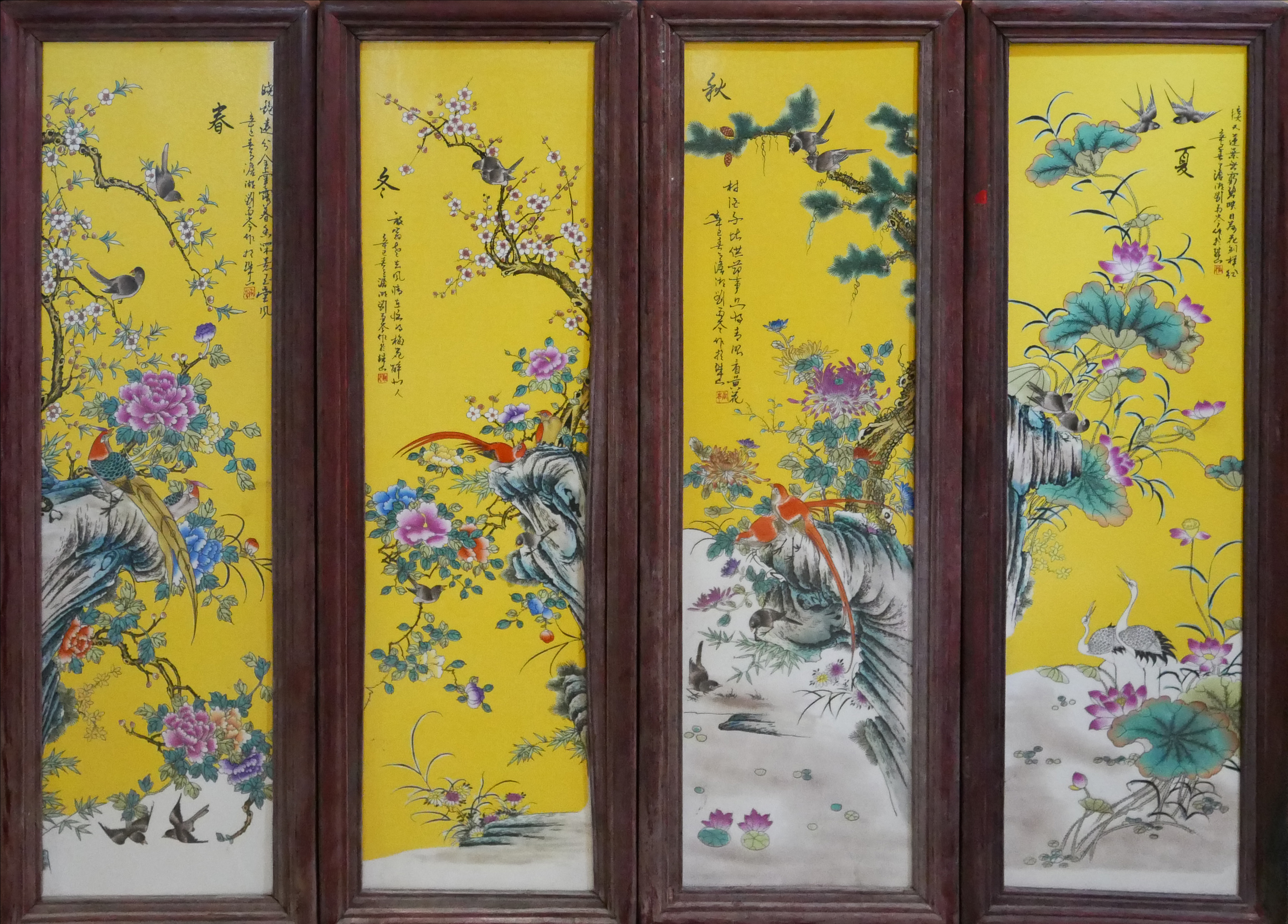 A SET OF FOUR ORIENTAL PORCELAIN PLAQUES Decorated in traditional manner with flora and fauna, on