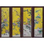 A SET OF FOUR ORIENTAL PORCELAIN PLAQUES Decorated in traditional manner with flora and fauna, on