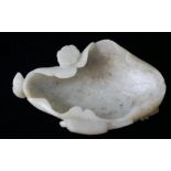 A CHINESE LATE MING/EARLY QING DYNASTY CARVED LEAF FORM JADE SHALLOW BOWL Organic form, bearing