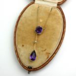 A VICTORIAN 15CT GOLD, AMETHYST AND SEED PEARL 'BELLE EPOQUE' PENDANT NECKLACE The cushion cut