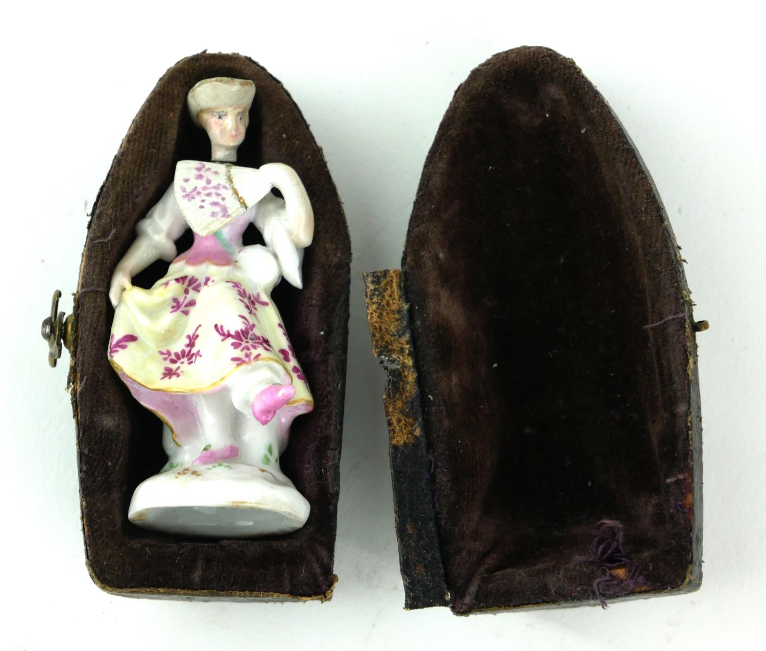 A 19TH CENTURY CONTINENTAL PORCELAIN MINIATURE FIGURAL SCENT BOTTLE Maiden wearing period attire,