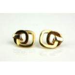 A PAIR OF 18CT GOLD EARRINGS Entwined geometric form. (approx 2cm x 2cm)