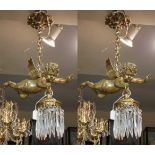 A PAIR OF DECORATIVE GILT BRONZE HANGING CHERUB CHANDELIERS Each holding a single light with crystal