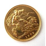 A QUEEN ELIZABETH II 22CT GOLD HALF SOVEREIGN COIN, DATED 1982 With George and Dragon to reverse.