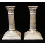 A PAIR EDWARDIAN SILVER CLASSICAL COLUMN CANDLESTICKS Hallmarked Barker Brothers, London, 1907, on