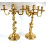 A PAIR OF HEAVY CLASSICAL DESIGN GILT BRONZE FIVE BRANCH CANDELABRA Figured with semi clad maidens