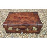 A VINTAGE TAN LEATHER SUITCASE Impressed with initials 'S.A.R', polished brass lever locks. (61cm