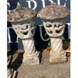 A PAIR OF RECONSTITUTED STONE GARDEN LANTERNS AND COVERS. (50cm) Condition: weathered