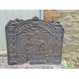 AN ANTIQUE CAST IRON FIRE BACK FIGURED WITH CHARLES I ON HORSEBACK. (75cm x 66cm) Condition: AF