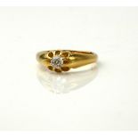 AN EARLY 20TH CENTURY 18CT GOLD AND DIAMOND SOLITAIRE SIGNET RING Having a single round cut