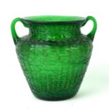 AN EARLY 20TH CENTURY AUSTRIAN IRIDESCENT GREEN ART GLASS VASE Having twin handles and raised