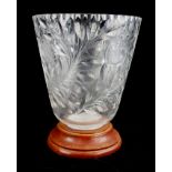 A LARGE EARLY 20TH CENTURY CUT FLORAL CUT GLASS VASE On a wooden base. (45cm) Condition: good