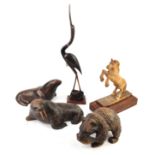 KANEKO, A COLLECTION OF EARLY 20TH CENTURY CANADIAN CARVED ANIMALS To include two sea lions and a