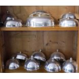 A COLLECTION OF TWELVE SILVER PLATED DOME FOOD COVERS. Condition: good