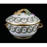 AN 18TH CENTURY ITALIAN BUEN RETIRO BOWL AND COVER The naturalistic handle above floral enamelled