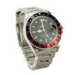 ROLEX, GMT-MASTER II, A STAINLESS STEEL GENT'S WRISTWATCH With red and black 'Pepsi' enamel bezel,