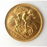 A QUEEN ELIZABETH II 22CT GOLD HALF SOVEREIGN COIN, DATED 1982 With George and Dragon to reverse.