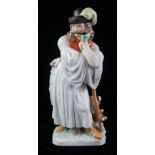 HEREND FACTORY, A HUNGARIAN PORCELAIN MODEL OF A STANDING SHEPHERD IN TRADITIONAL REGIONAL DRESS