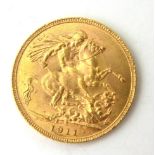 A KING GEORGE V 22CT GOLD FULL SOVEREIGN COIN, DATED 1911 With George and Dragon to reverse.