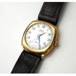 AN EARLY 20TH CENTURY 9ct GOLD GENTS WRISTWATCH With white circular dial with Arabic number markings