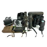 A COLLECTION OF EARLY 20TH CENTURY AND LATER BINOCULAR AND CAMERAS To include a pair of ebonised