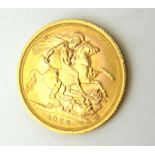 A QUEEN ELIZABETH II 22CT GOLD FULL SOVEREIGN COIN, DATED 1966 With George and Dragon to reverse.