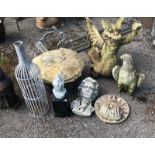 A GROUP OF SEVEN GARDEN ORNAMENTS To include wooden dragon, Buddhas, mushroom etc, along with