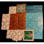 STOKE-ON-TRENT, A SET OF FIVE ART NOUVEAU TILES Along with a pair of large brown lustre glazed