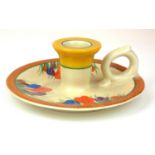 CLARICE CLIFF, BIZARRE RANGE, A SINGLE HANDLED POTTERY CHAMBERSTICK In 'Crocus' pattern, painted