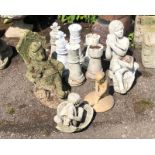 A GROUP OF TEN VARIOUS GARDEN STATUES Chess pieces and statues. (25cm) Condition: weathered