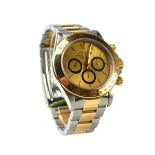 ROLEX, COSMOGRAPH DAYTONA, AN 18CT GOLD AND STAINLESS STEEL GENT'S WRISTWATCH Champagne tone dial