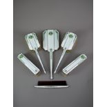 A SET OF SILVER, ENAMEL AND CHINESE JADEITE ART DECO BRUSHES, CIRCA 1930 Comprising two long handled