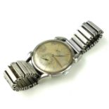 ROLEX, PRECISION, A VINTAGE STAINLESS STEEL GENT'S WRISTWATCH With silver tone dial and subsidiary