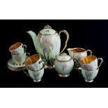 A FINE ART DECO CARLTON WARE COMPLETE COFFEE SERVICE FOR SIX Decorated with a magical tree and