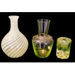 A COLLECTION OF THREE VICTORIAN URANIUM GLASS ITEMS To include a bottle vase with spiral decoration,