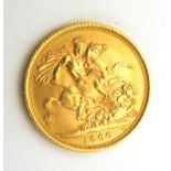 A QUEEN ELIZABETH II 22CT GOLD FULL SOVEREIGN COIN, DATED 1966 With George and Dragon to reverse.