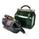 A GREEN LEATHER FAUX CROCODILE SKIN HANDBAG Along with another.